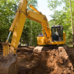 Teen Arrested After Allegedly Swinging Stolen Excavator Bucket at Owner and Son in Toledo