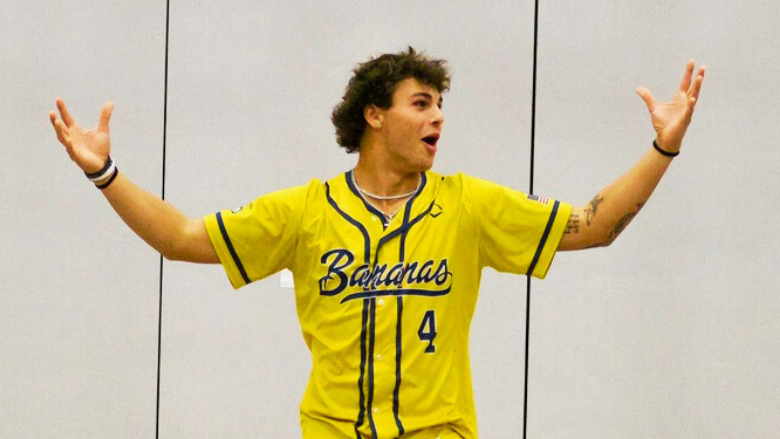 Savannah Bananas player Kyle “KJ” Jackson gestures to students during his visit to Otsego Elementary School on December 5.
